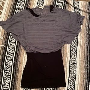 A size M ( woman ) tightly fitted dress with a grey,light,and see through poncho
